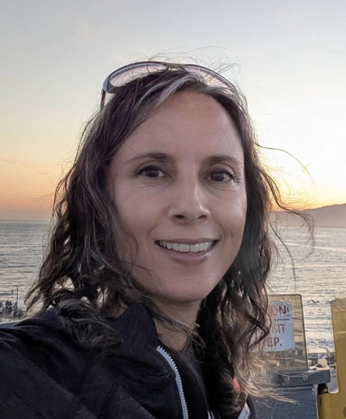 Me at sunset with the Pacific Ocean in the background